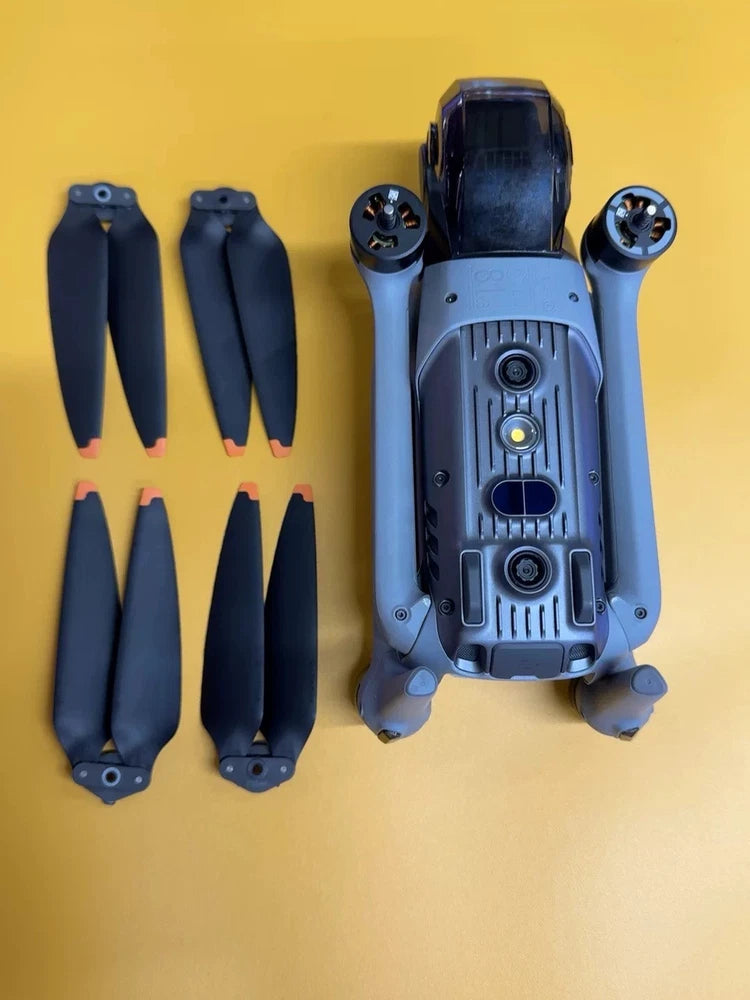 DJI Air 3 drone unit with detached propellers, body and camera module