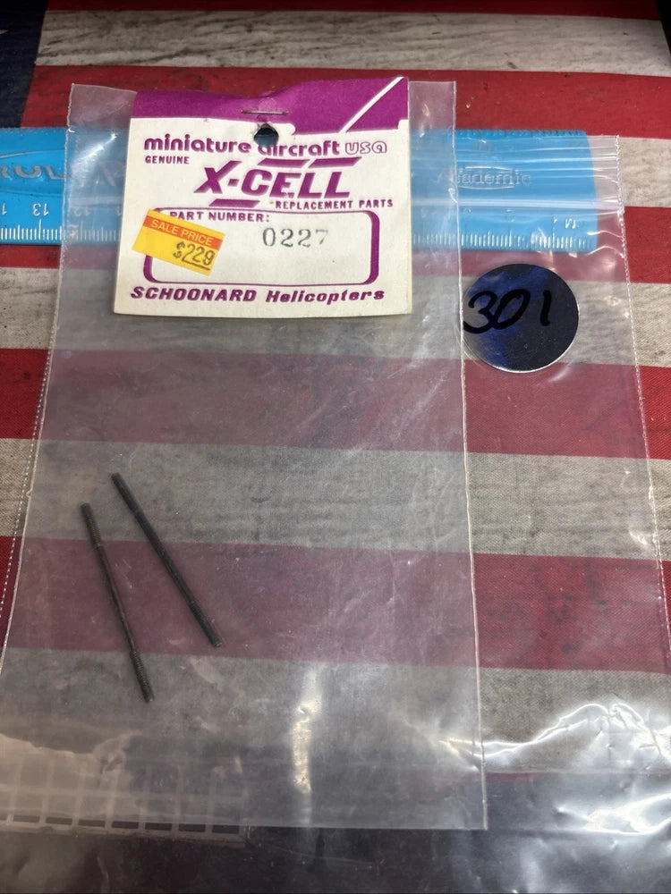 X-Cell 0227 Schoonard RC helicopter replacement part in sealed package with rods