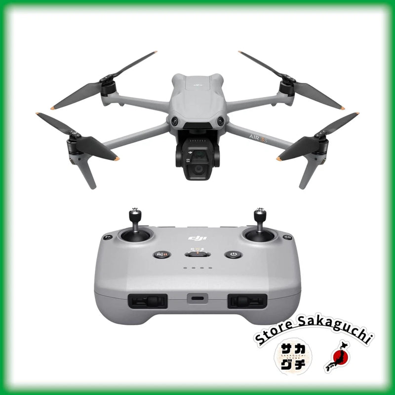 Gray quadcopter drone with front camera and white remote controller