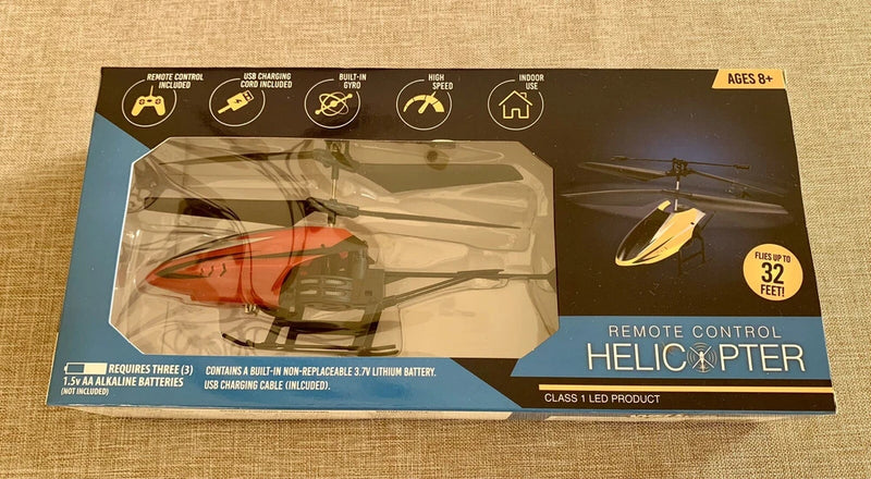 Red RC helicopter toy in retail box, remote control helicopter for ages 8+