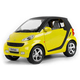 Yellow 1/24 diecast model car with black roof, open door detail