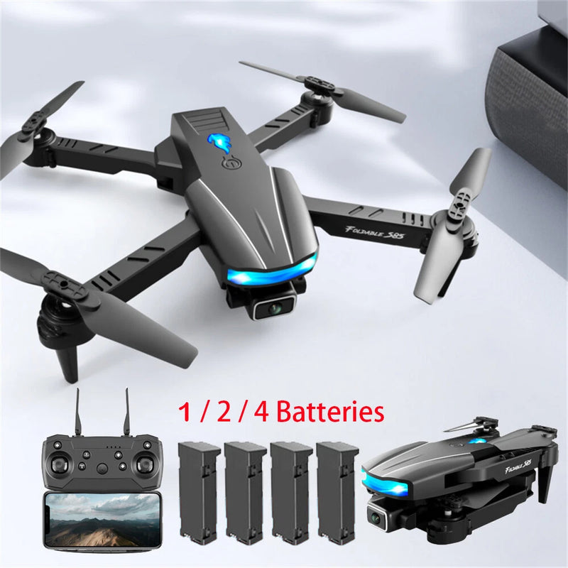 Foldable quadcopter drone with dual cameras, remote, and four batteries shown
