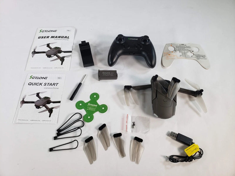 Foldable mini drone starter kit with controller, propellers, battery, charger, manuals