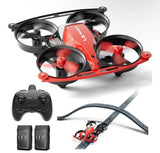 Mini indoor RC quadcopter drone with red frame, black rotors, remote and track pieces