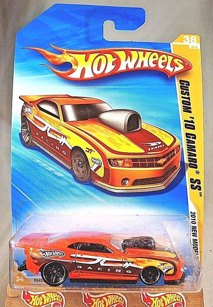 Orange flame Hot Wheels die-cast car in blister pack, black wheels
