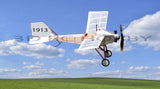 White RC monoplane model airplane with nose spinner and landing gear