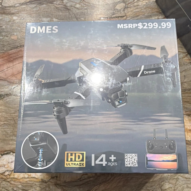 DMES P13 foldable quadcopter drone box with HD camera and remote controller.