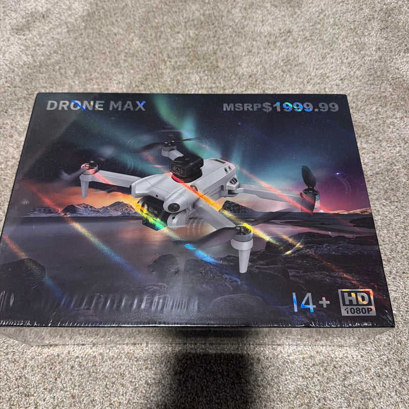 Four-axis aerial drone box showing gray drone with orange accents and four propellers