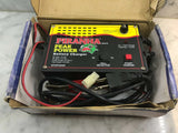 RC battery charger with display panel and red/black AC/DC cables