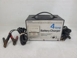 4 Amp battery charger with attached cords and alligator clip leads, metal unit