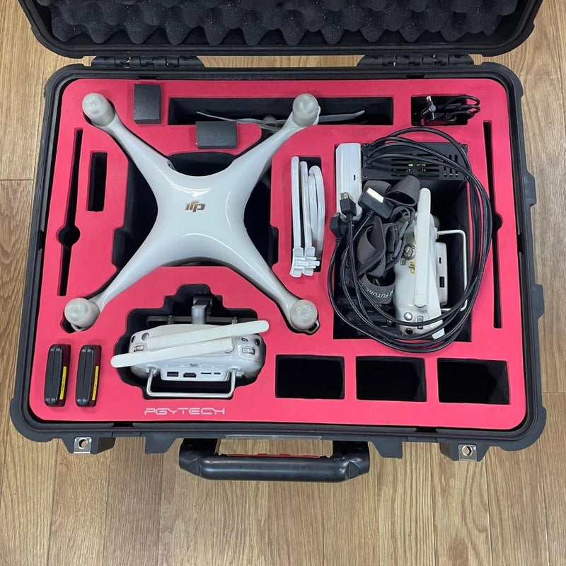 DJI Phantom 4 Pro drone accessory kit in hard case with foam inserts and cables