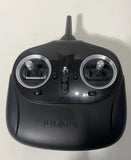 Propel drone remote control, black handheld with two joysticks and center button, front view
