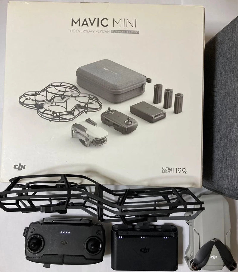 DJI Mavic Mini drone and accessory kit with case, batteries, and controller