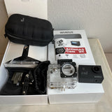 Waterproof action camera kit with clear case, black mount, straps, and remote-ready body