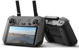 Gray handheld drone remote controller with touchscreen display, buttons, and dual antennas