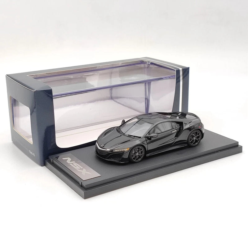 Black 1/43 scale NSX sedan model car in clear display case