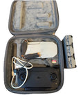 DJI Mini SE drone in soft zip case with controller, cables, and prop guard