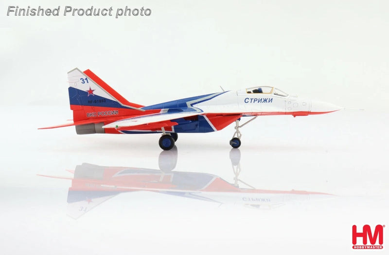 MIG-29 model airplane with red, white and blue livery, number 31 on tail