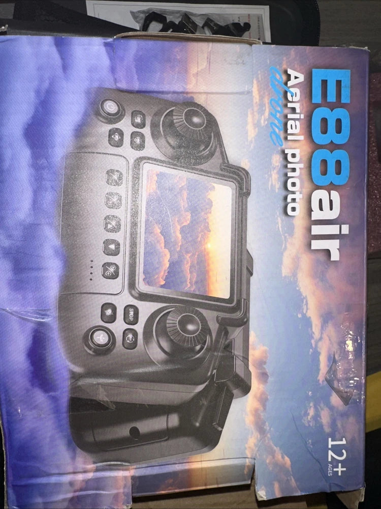 E88 Air aerial photo drone retail box with drone controller illustration and display