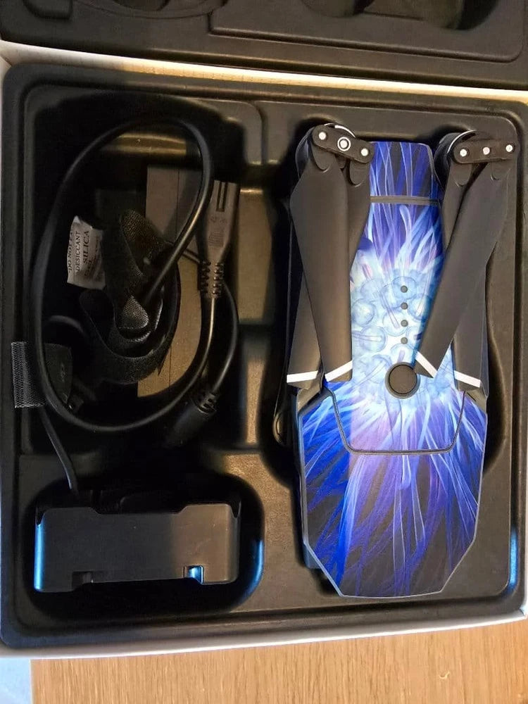 Drone battery and charger in hard case, with blue-pattern battery skin