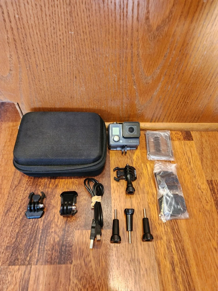GoPro Hero action camera kit with waterproof case, mounts, and accessories