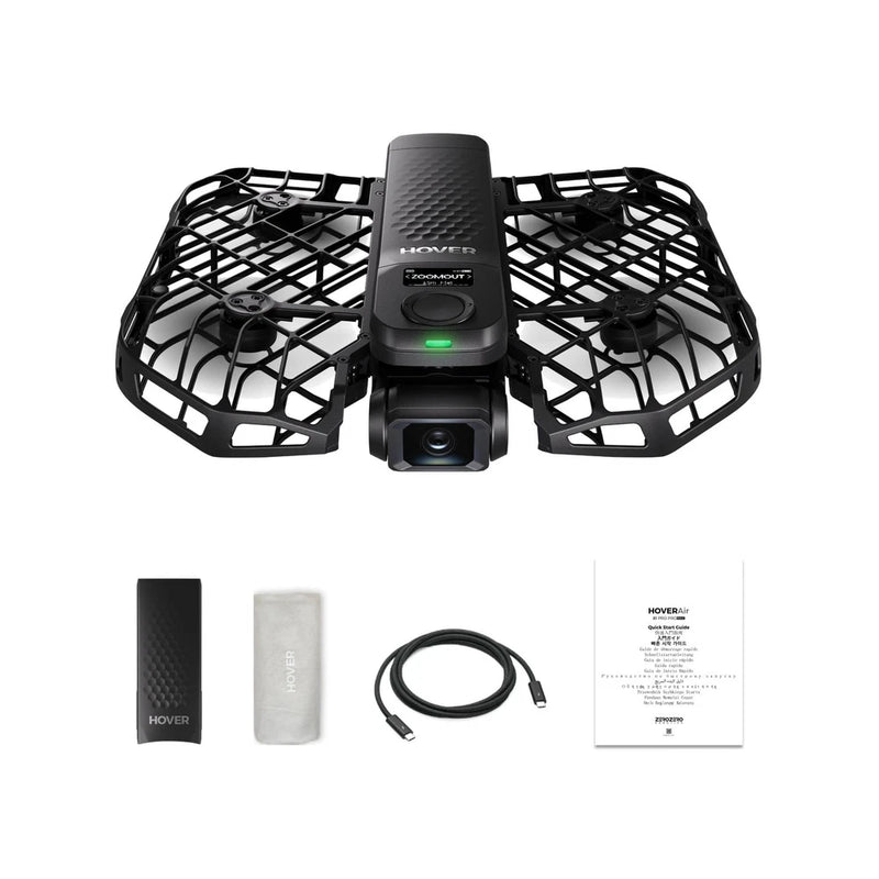 Foldable drone with camera, black protective cage, and included cables & manual