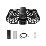 Foldable drone with camera, black protective cage, and included cables & manual
