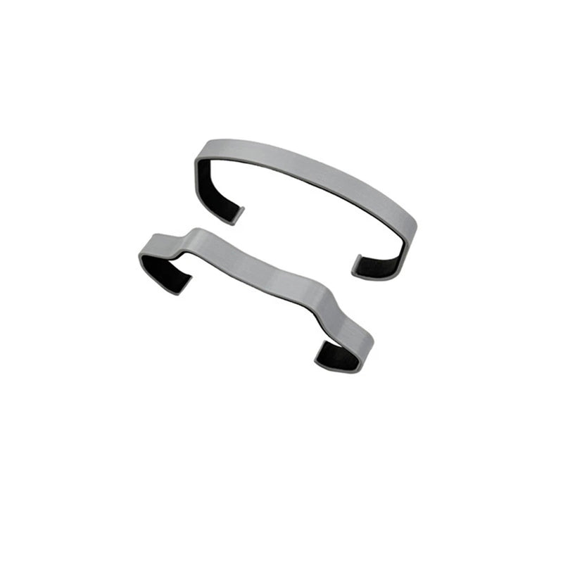 Drone paddle retainer set with two curved gray mounts and black rubber pads