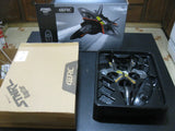 Indoor/outdoor drone kit in open box, showing black drone body and parts