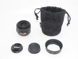 Nikon 35mm f/1.8G DX DSLR lens with hood and front/rear caps, black pouch