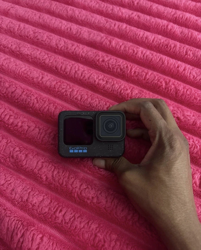 GoPro HERO12 Black touchscreen action camera with front lens and display screen