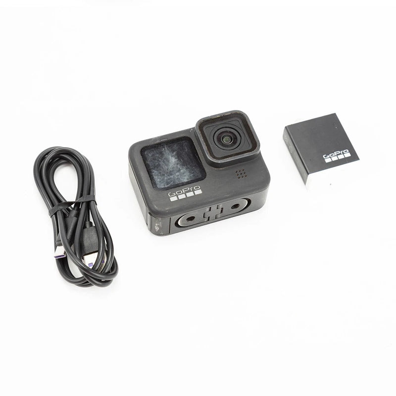 GoPro HERO9 Black action camera with connecting cable and mounting parts