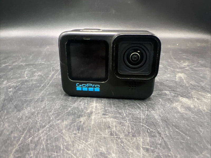 Black GoPro action camera with front lens and screen on dark housing