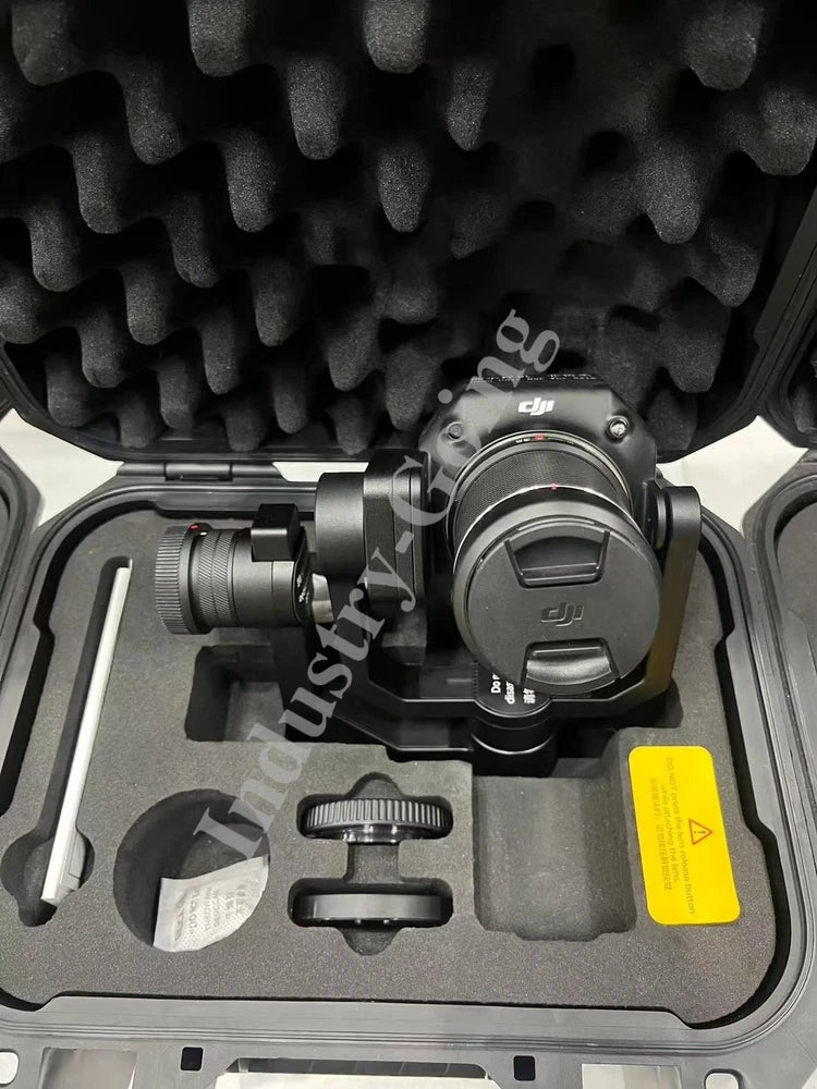 DJI Zenmuse P1 camera gimbal in gray foam case with yellow warning label