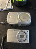 Two Digital Cameras Panasonic Lumix And Olympia Camedia D-390