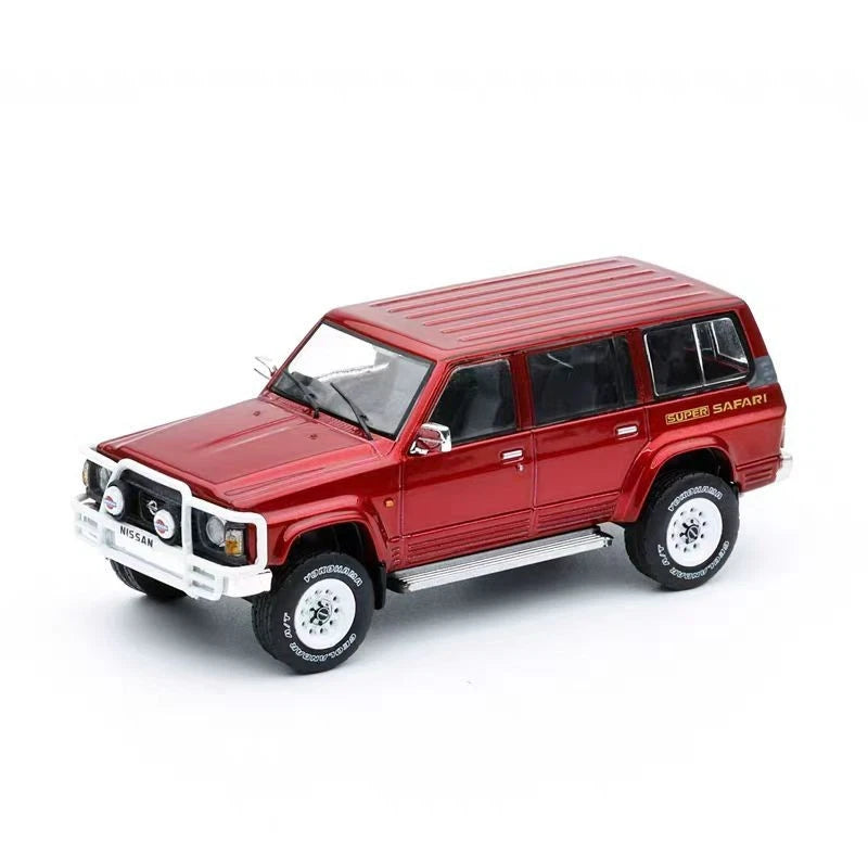 Red die-cast alloy patrol SUV model, front-left view with grille and headlights
