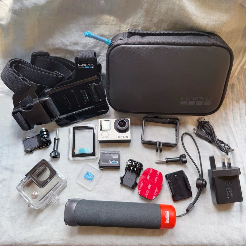 GoPro HERO4 Silver action camera kit with waterproof housing, touch LCD, and accessory bag