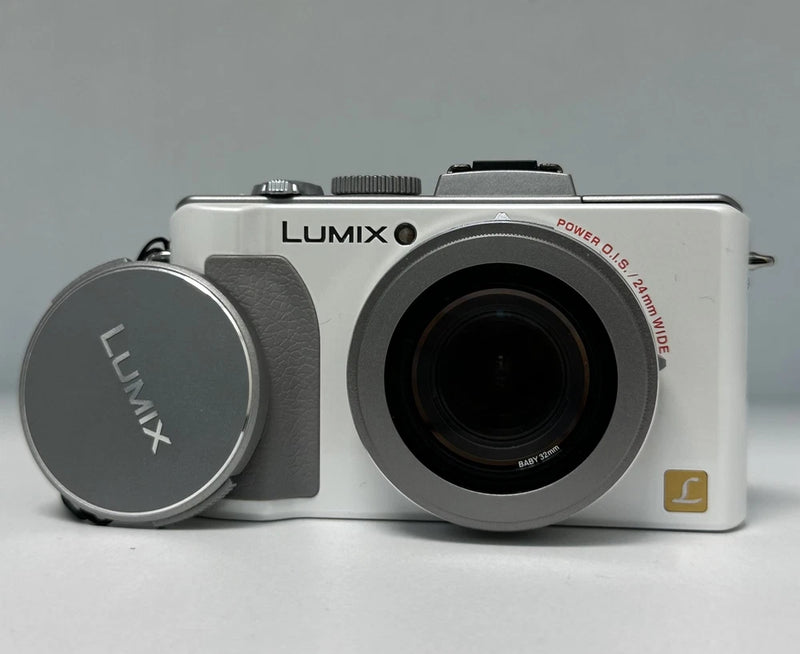 Panasonic LUMIX DMC-LX5 10.1MP 3.8X Optical Zoom Digital Camera HD videos