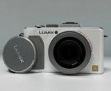 Panasonic LUMIX DMC-LX5 10.1MP 3.8X Optical Zoom Digital Camera HD videos