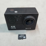 Black 4K mini action camera with Wi-Fi, lens, power/mode buttons; includes 32GB microSD card