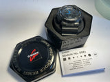 Men's G-Shock wristwatch with dark face, open caseback, module info card