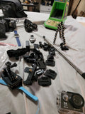 4K HD action camera kit with assorted mounts, tripod, and accessory parts