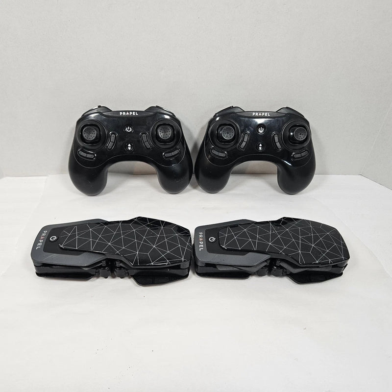Black drone remote controllers and compact drone body with textured grip panels