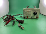 12V battery tester with analog meter, test leads, and red/black probes