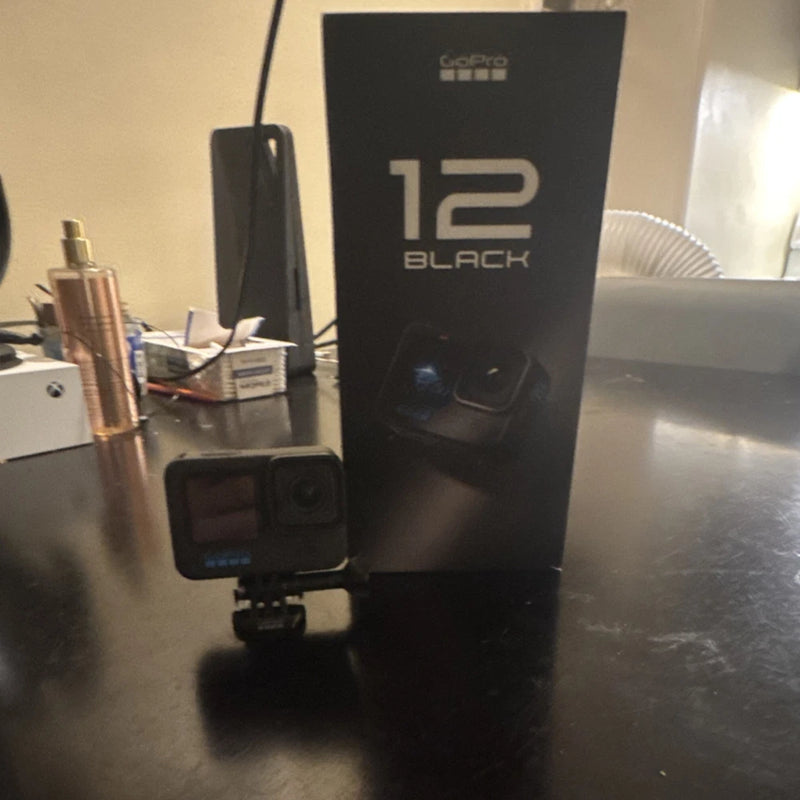 GoPro HERO12 Black action camera with touch screen and retail box