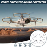 Light gray propeller guard with four protective arms for a drone