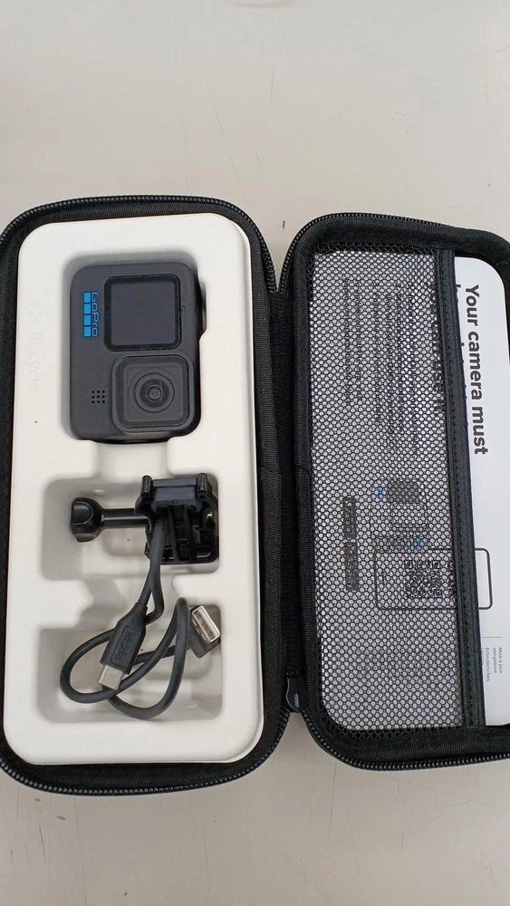 GoPro HERO10 action camera with mounts and cable, in a zippered carrying case