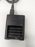 Black 4-bay AA/AAA Ni-MH battery charger with power cable and LED indicator