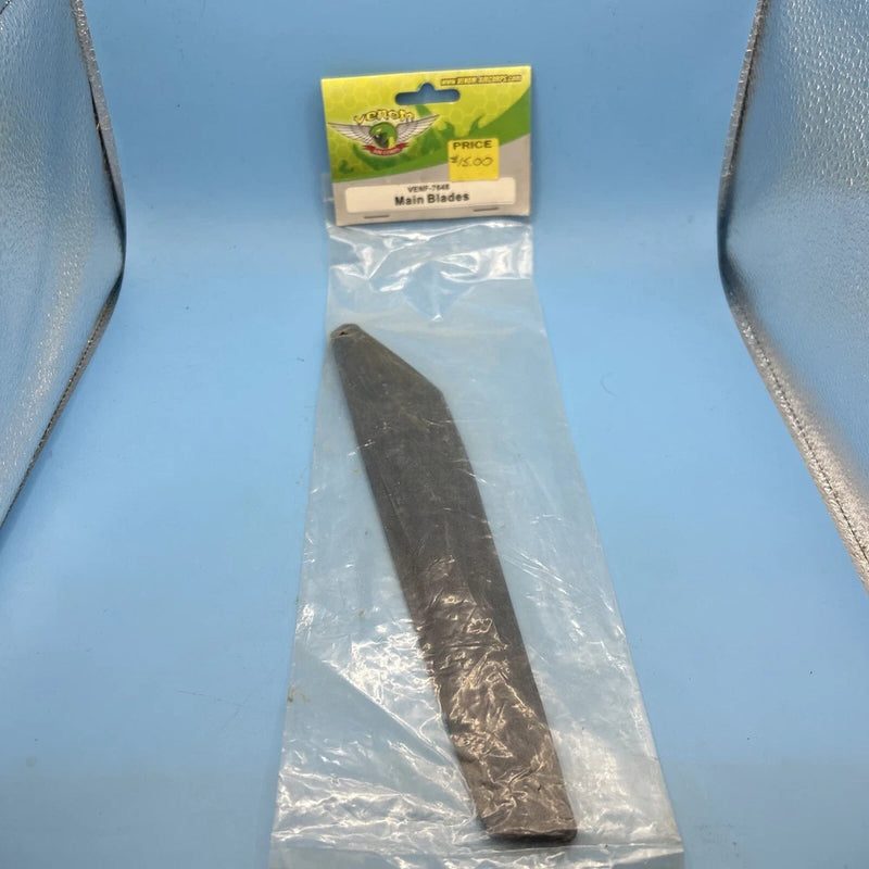 Main rotor blade for RC helicopter, dark gray metal blade in plastic bag