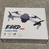 Foldable camera drone box with quadcopter illustration